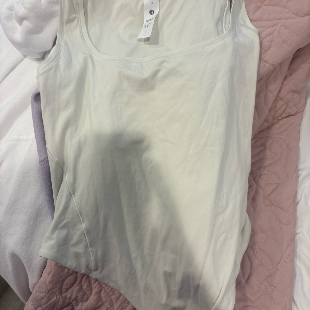 Lululemon Athletica Cream Bodysuit